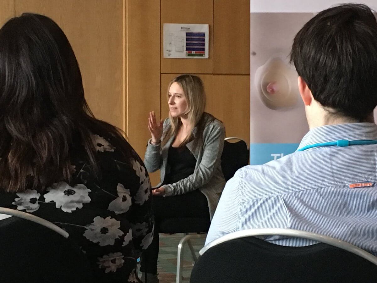 Rachel attending a meeting